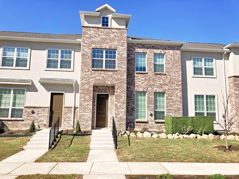 a home with brick and stone exterior